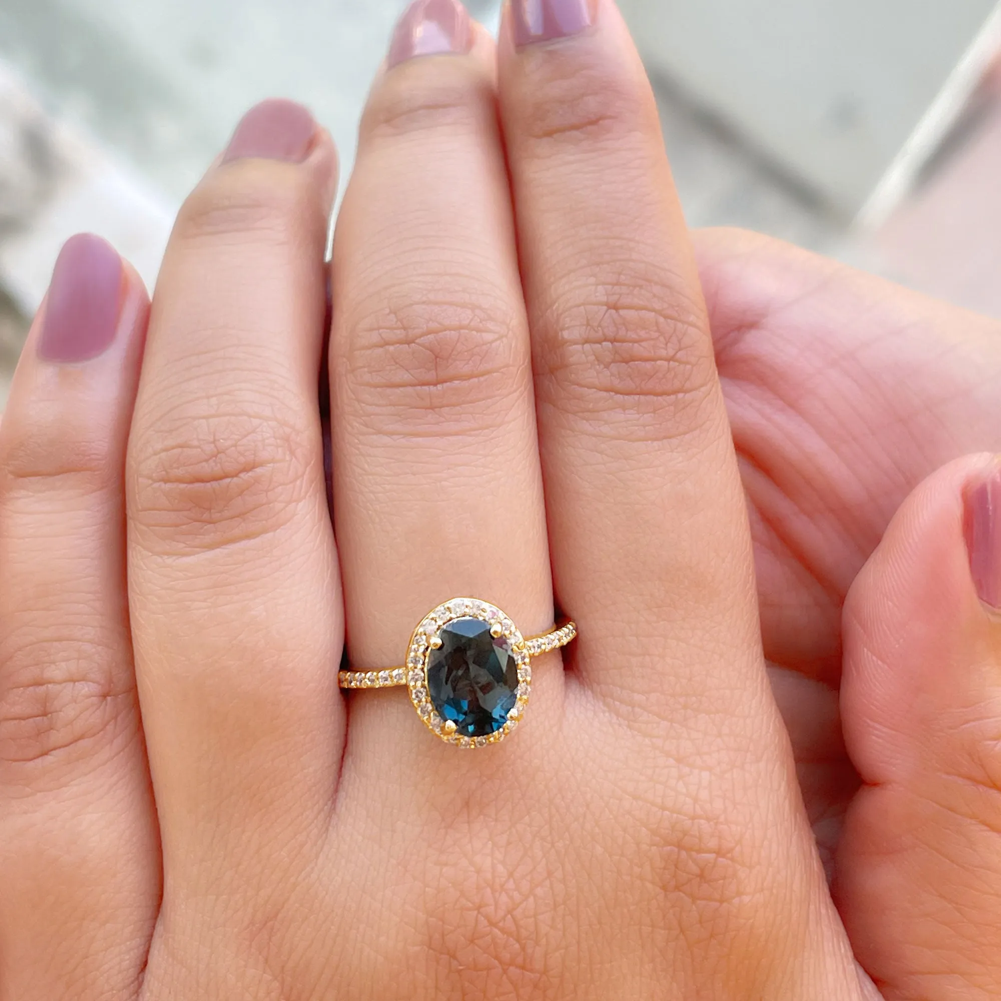 3 CT Classic Oval Cut London Blue Topaz and Diamond Halo Ring