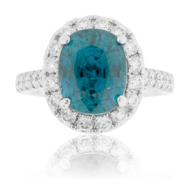 Blue Zircon, Diamond Halo and Diamond Accented Ring