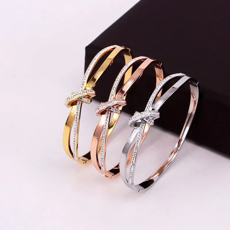 Elegant Knotted Cross Zircon Adorned Bangle Bracelets