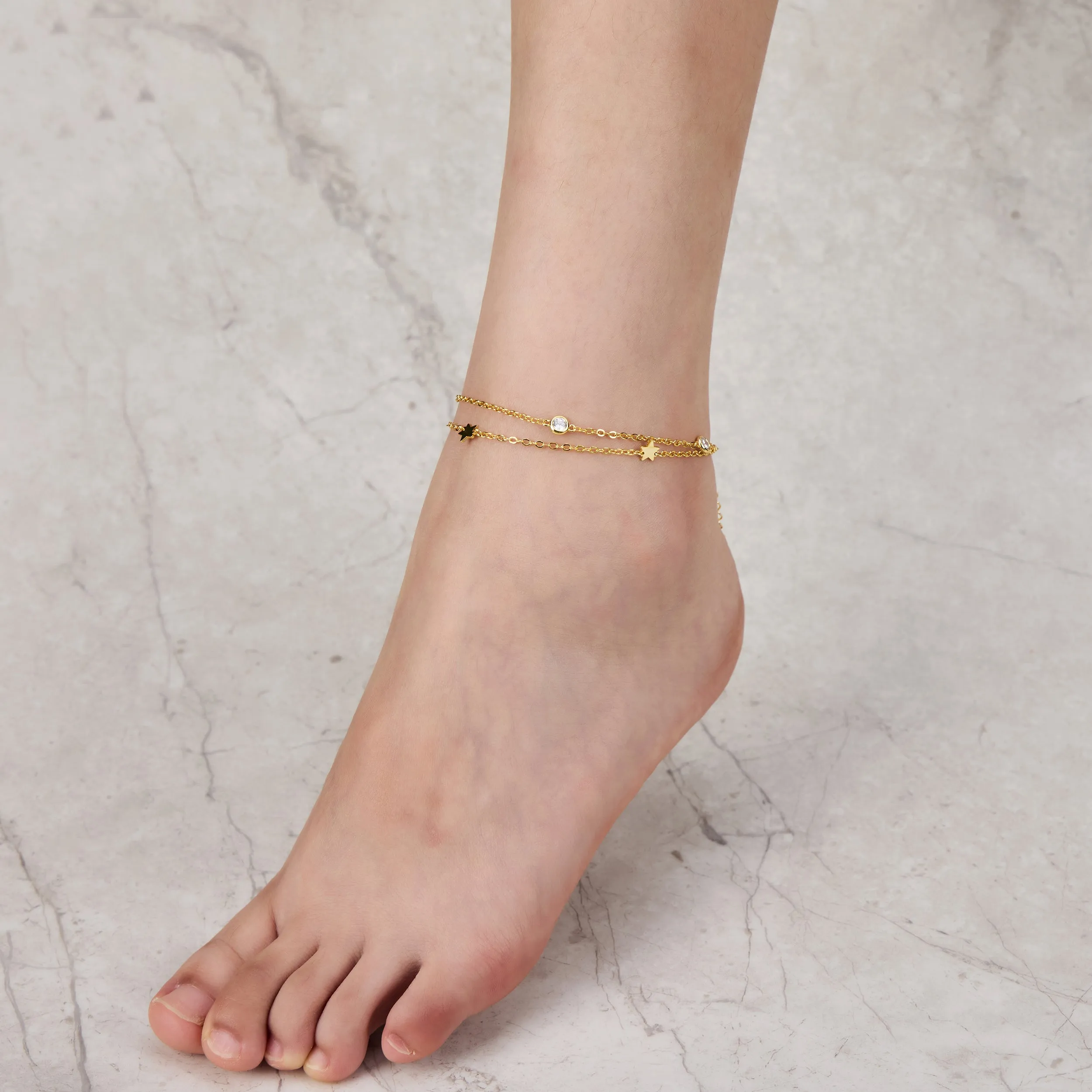 Gold Plated Layered Star Anklet Created with Zircondia® Crystals