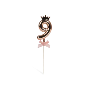 Number 9 on a stick with a rose gold crown