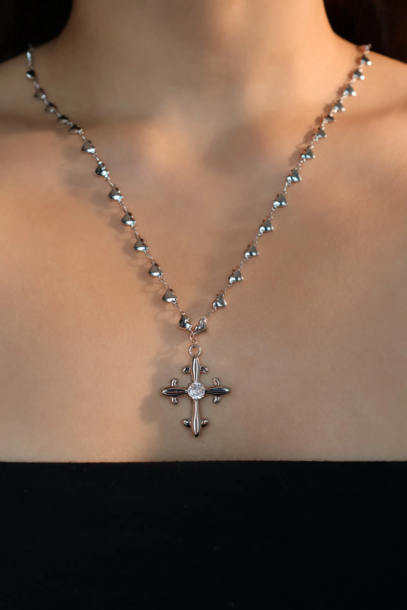 Platinum Plated Diamond Cross of Hearts Necklace