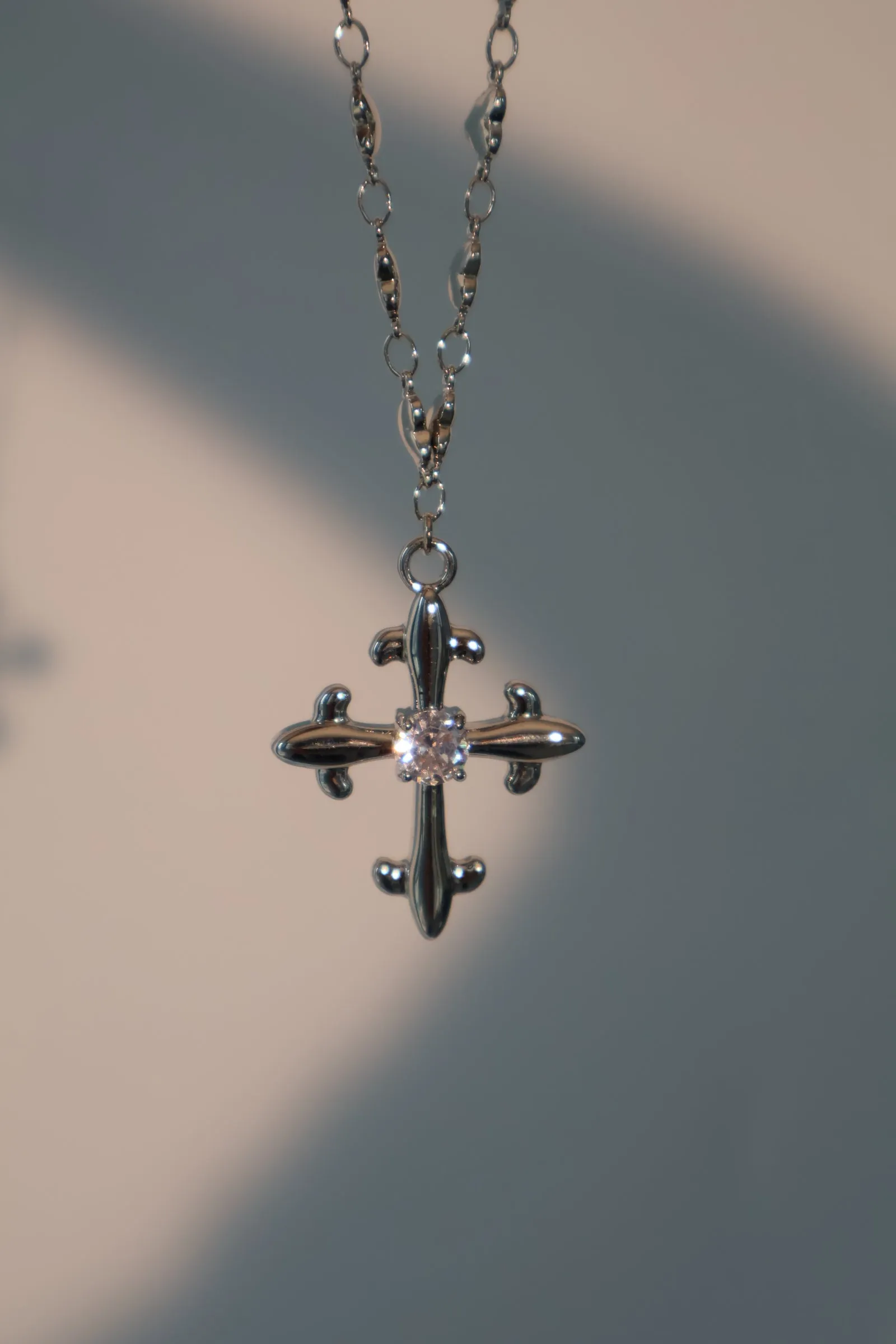 Platinum Plated Diamond Cross of Hearts Necklace