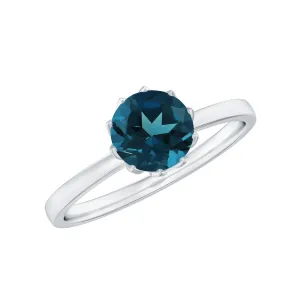 Round Cut London Blue Topaz Solitaire Ring in Lotus Basket Setting