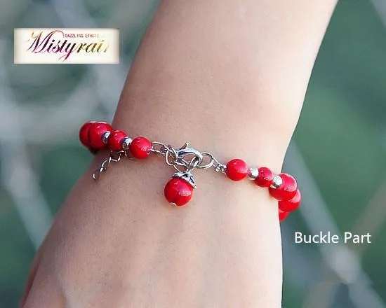 Tibetan silver fish and bell with red coral bracelet