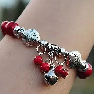 Tibetan silver fish and bell with red coral bracelet