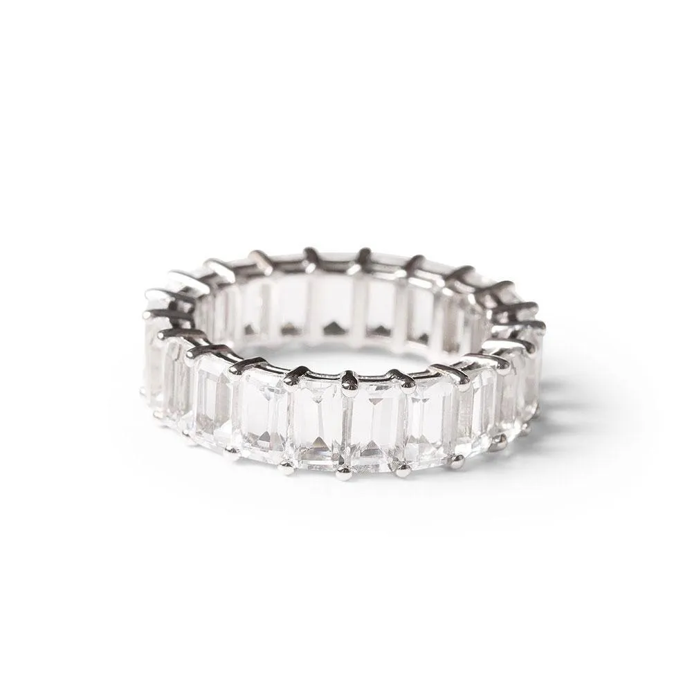 TOPAZ EMERALD CUT ETERNITY BAND