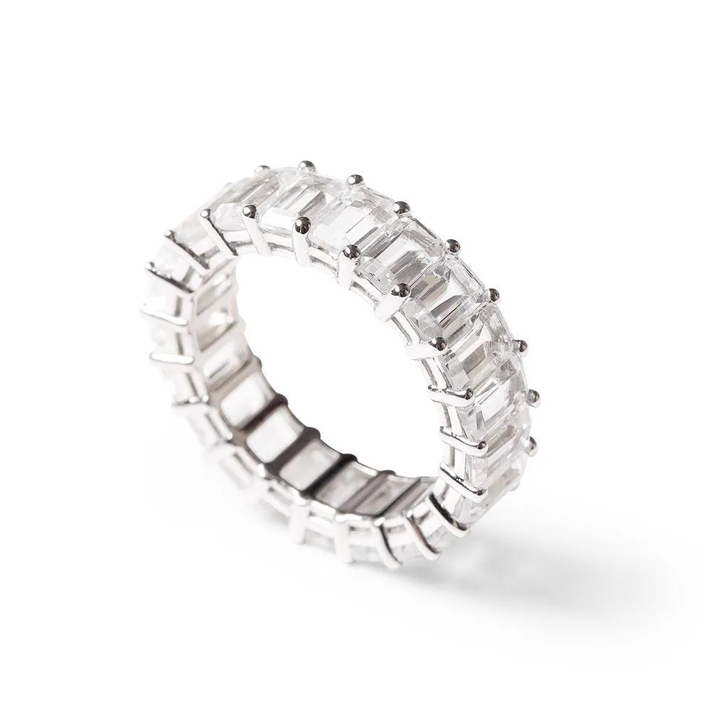 TOPAZ EMERALD CUT ETERNITY BAND